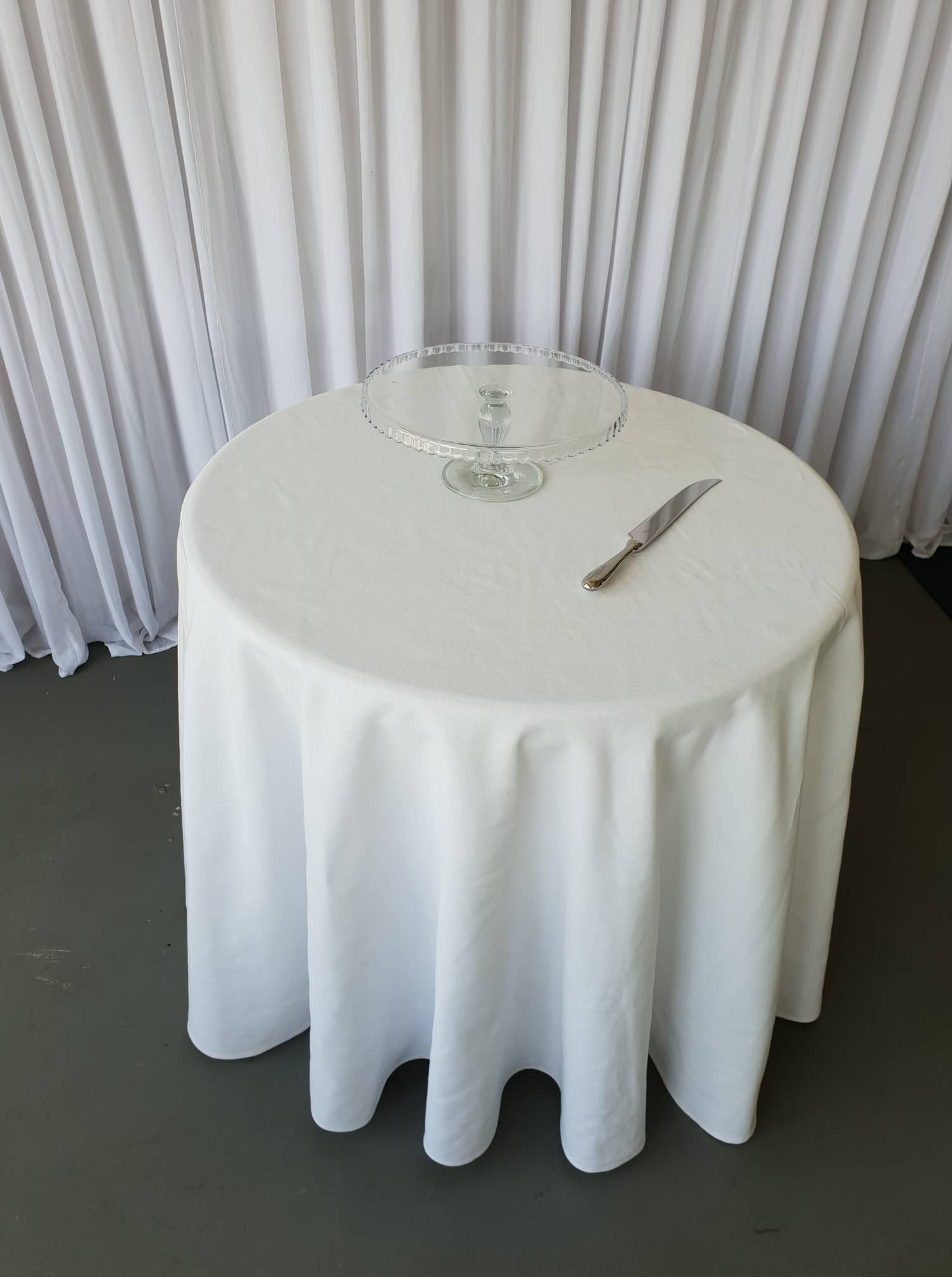 Catering equipment arranged on event tables